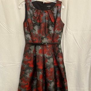 Size 6, red and black designs, with darker gray areas.
